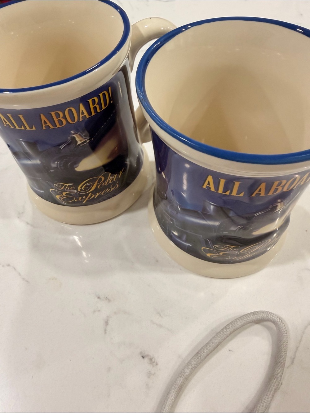 Warner Bros. Polar Express Cream and Blue Ceramic Mug Set